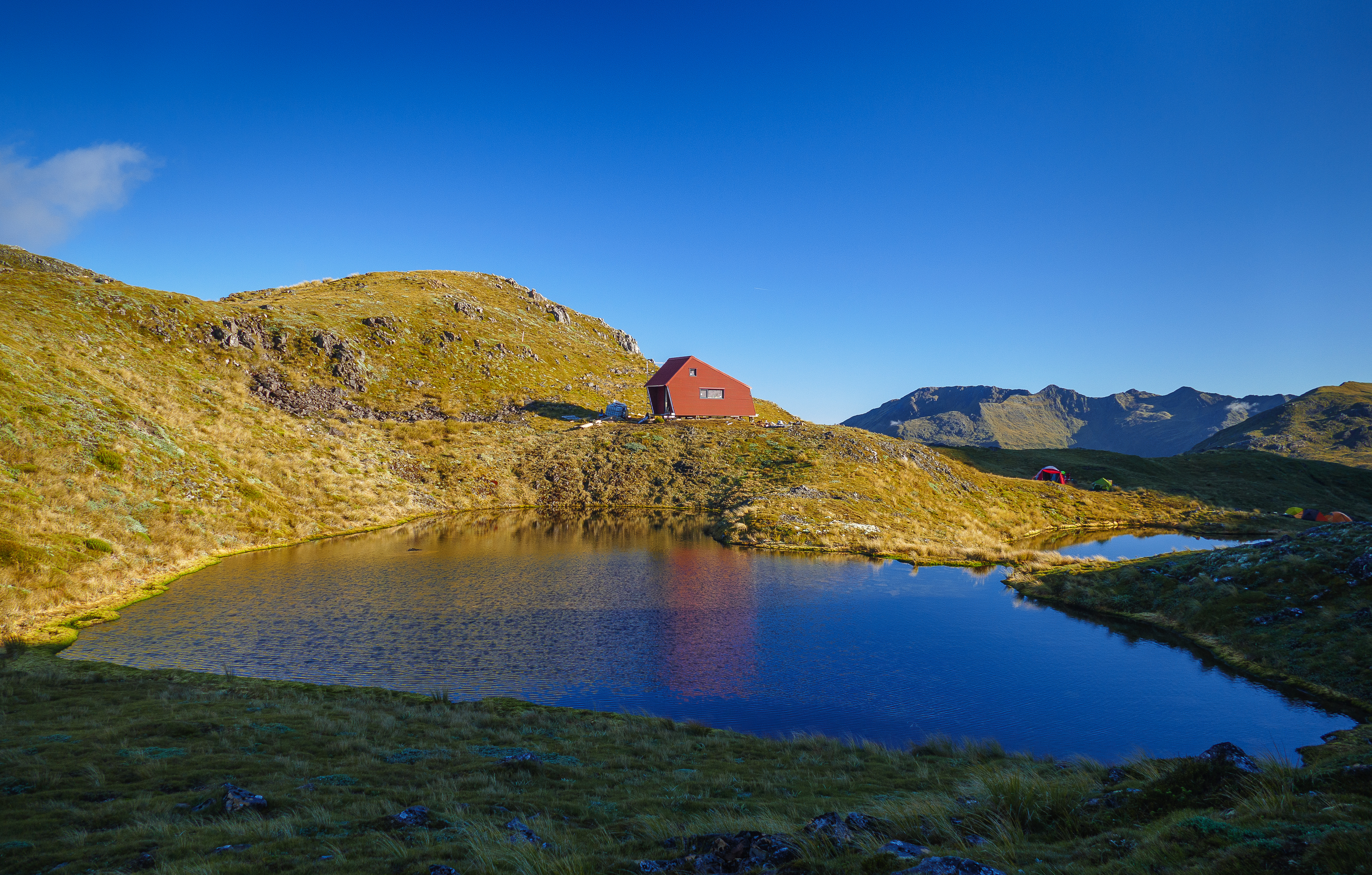 4YY4VGOIEJEEUVC_BrassMonkey_Hut_across_the_tarn_looking_west_Graeme_Jacobs_Photography_2.jpg