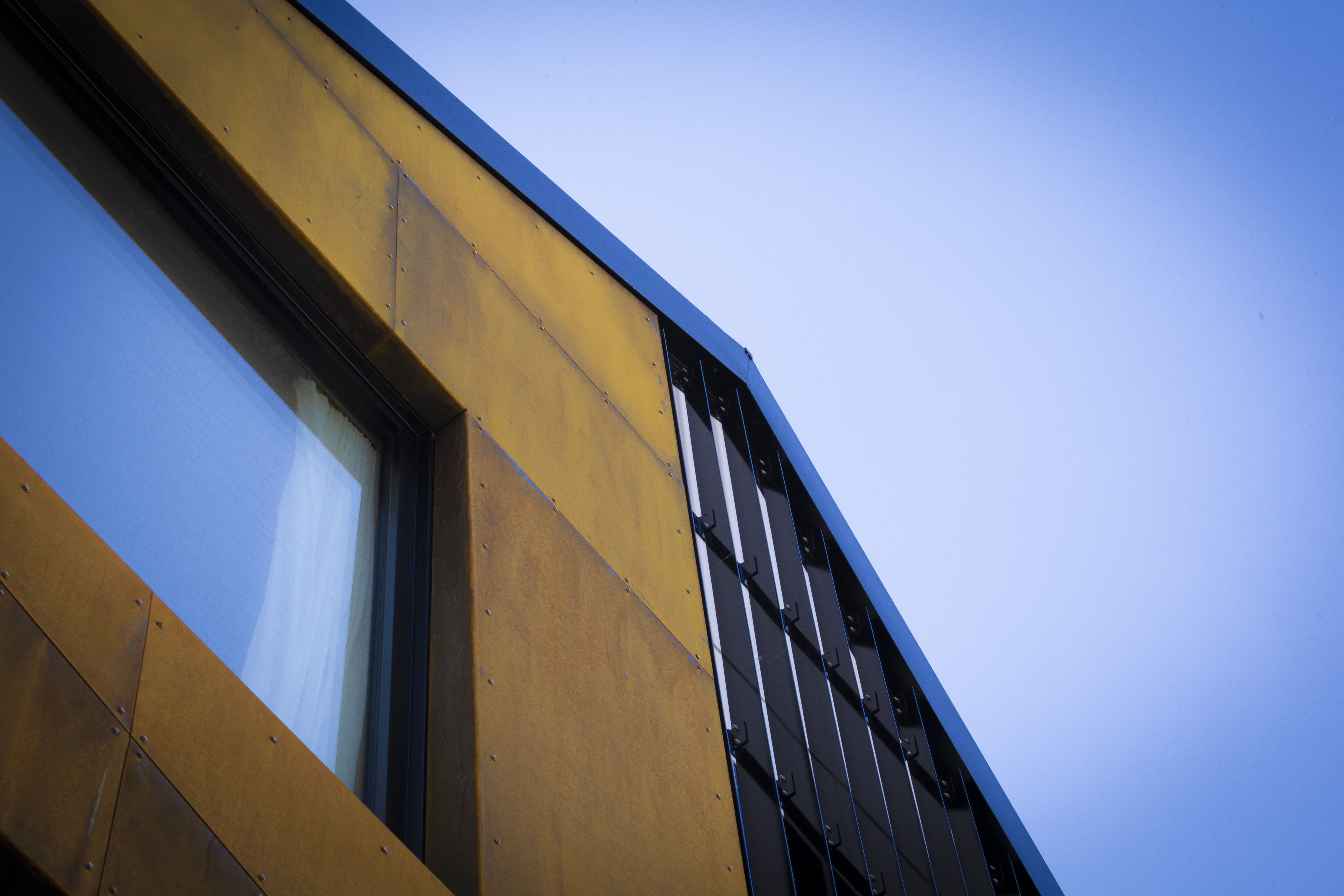 Apartment 41, Corten Facade and Steel Fins
